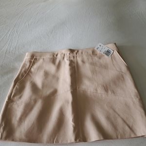 Soft pink faux leather mini skirt